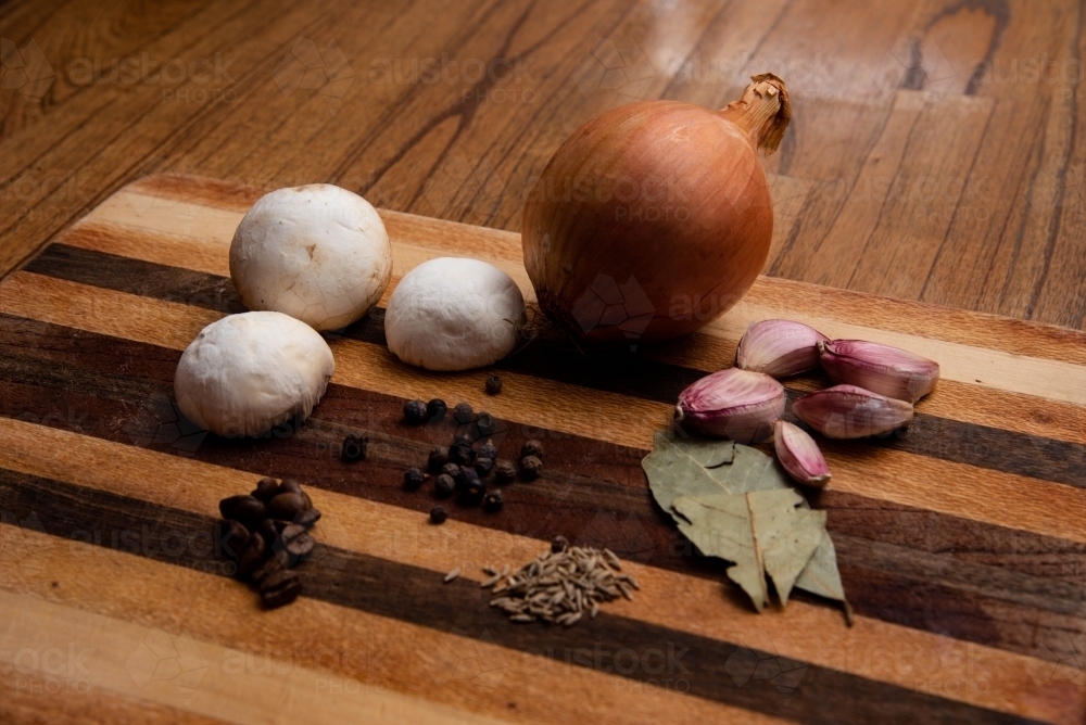 Ingredients on a timber chopping board - Australian Stock Image