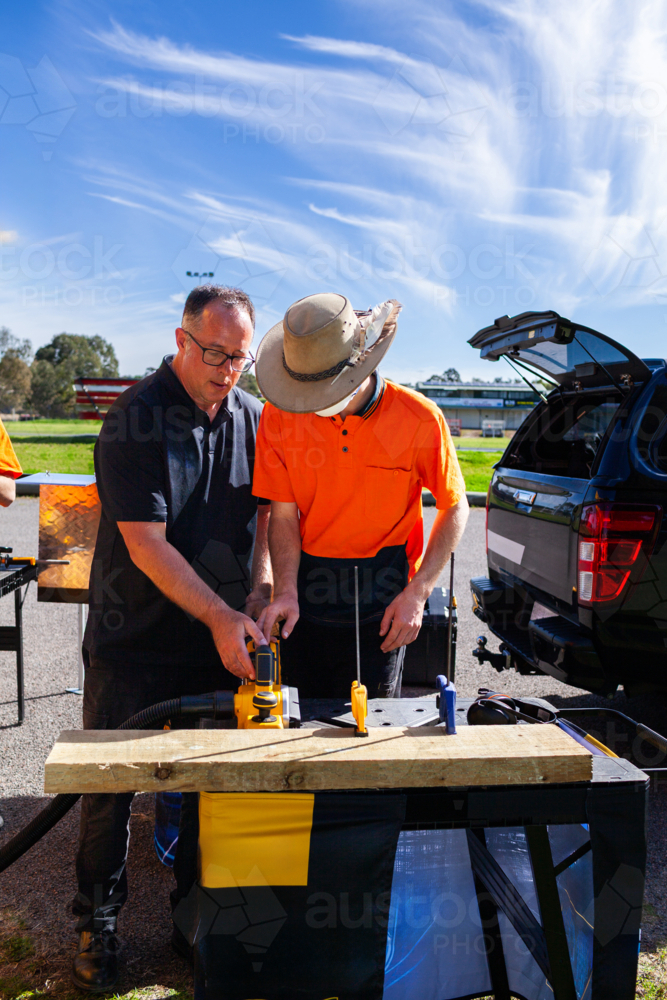 Image of instructor giving hands on tool demonstration during class for ...