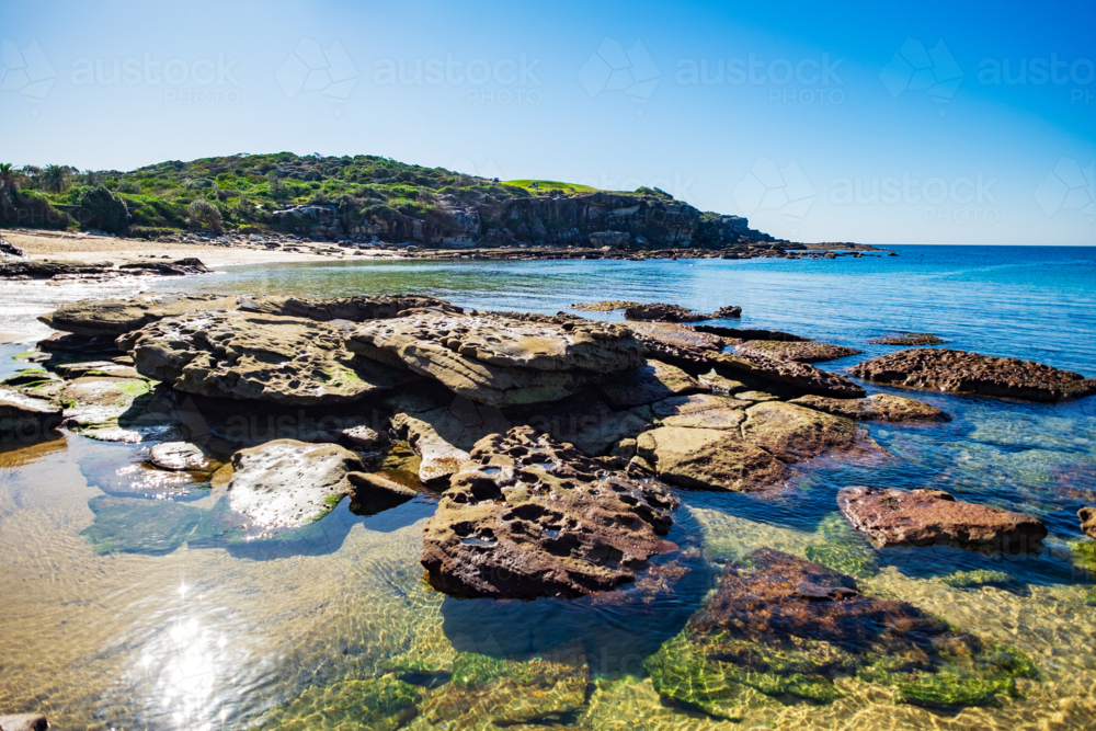 interesting rock formation at Little Bay beach - Australian Stock Image