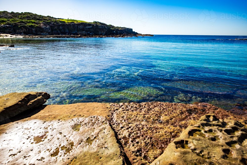 interesting rock formations at Little Bay beach - Australian Stock Image