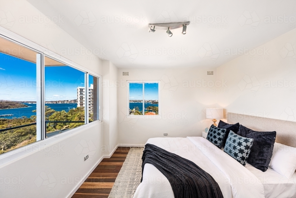 Image of Interior bedroom with views of the harbour - Austockphoto