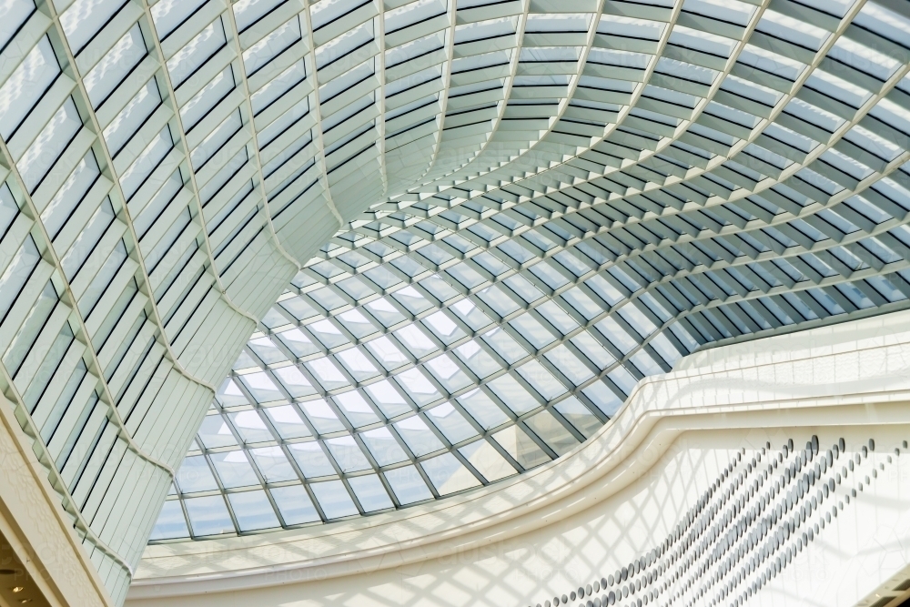 Interior view of a curved ceiling of glass windows - Australian Stock Image