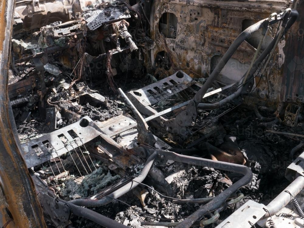 Internals of a burnt out car - Australian Stock Image