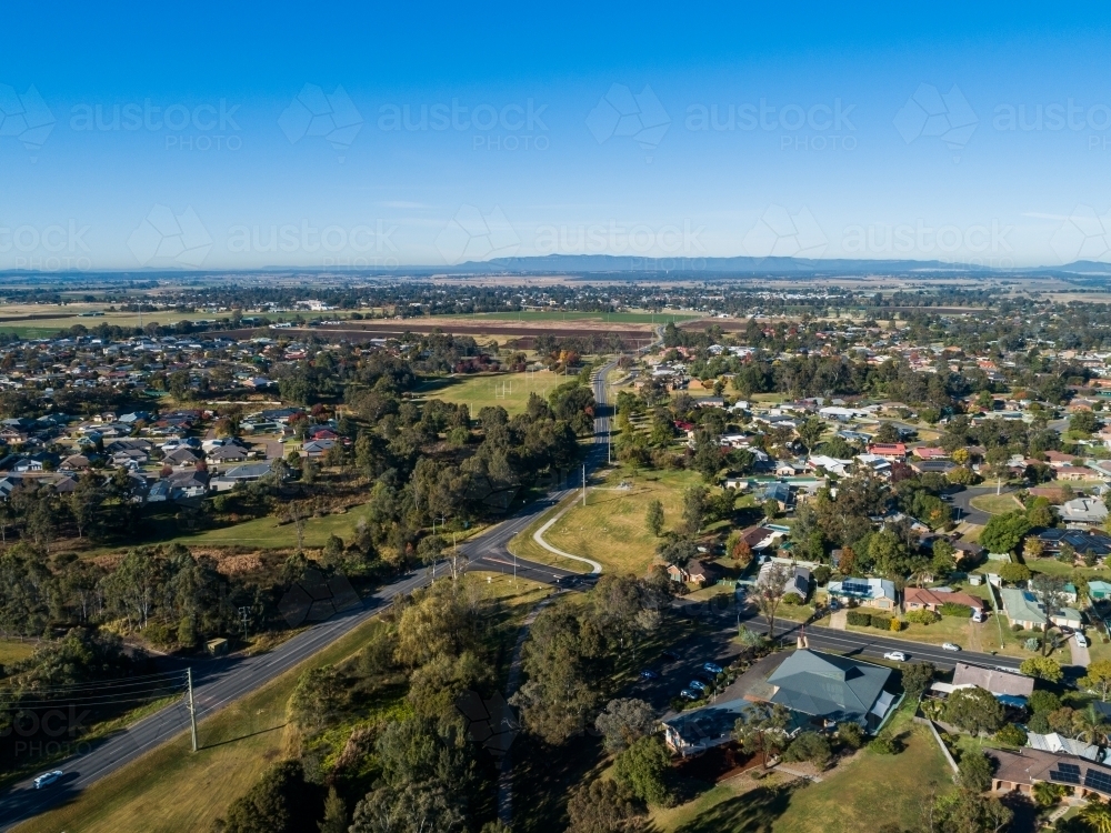 Intersection of roads with church on one corner and houses - Australian Stock Image