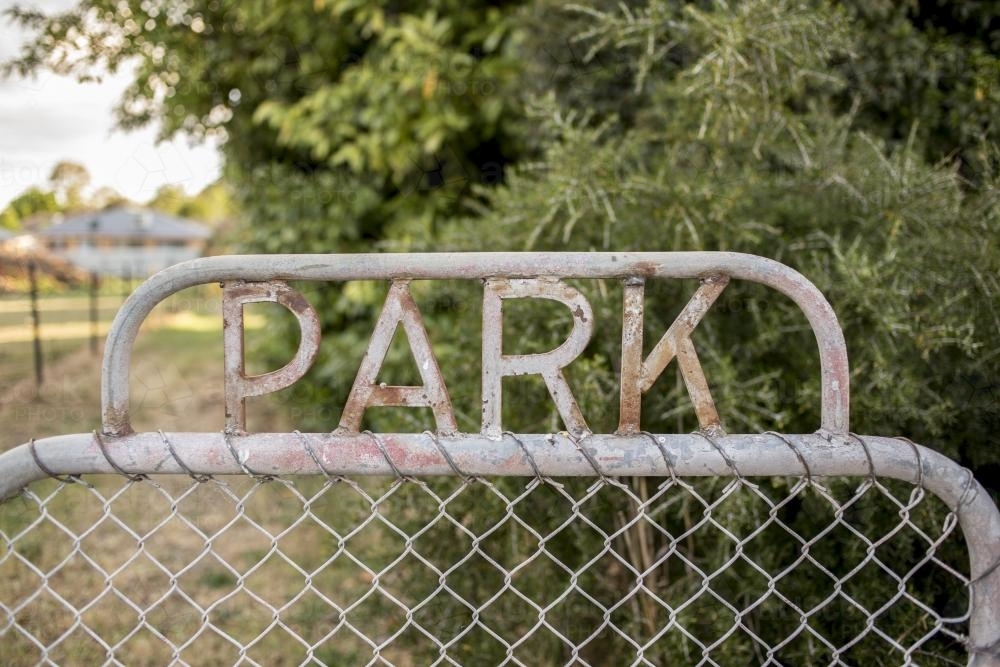 Iron Park Gate with bushy background - Australian Stock Image