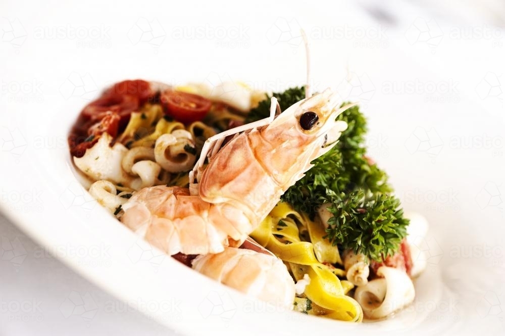 Italian seafood pasta with king prawn - Australian Stock Image