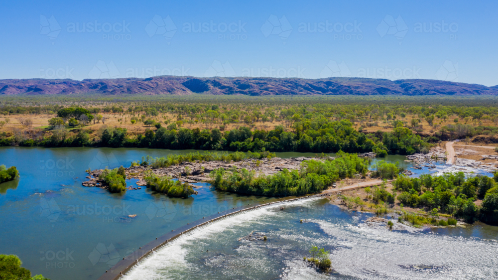 Ivanhoe Crossing with Cockburn Range in background - Australian Stock Image