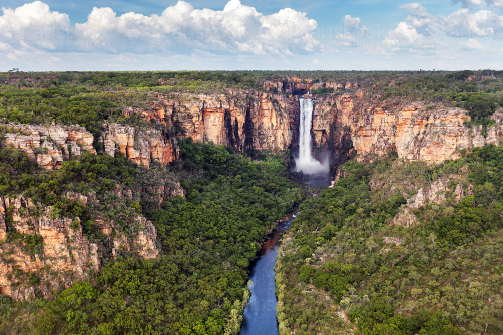 Jim Jim Falls flowing in the wet season, Kakadu National Park - Australian Stock Image