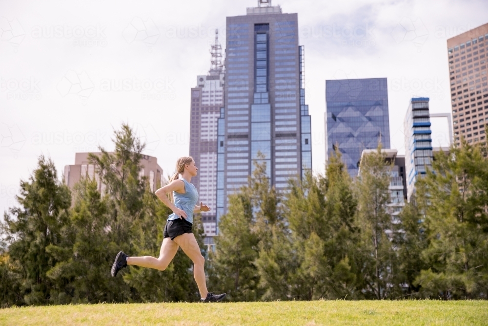 Jogging After Work Near the City - Australian Stock Image