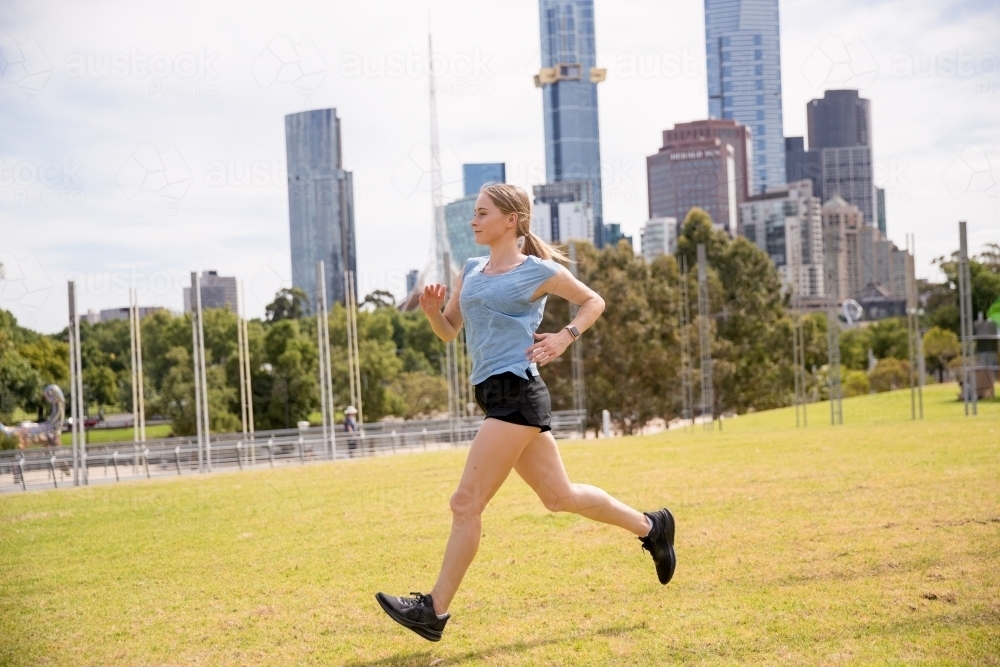 Jogging in a City Park - Australian Stock Image
