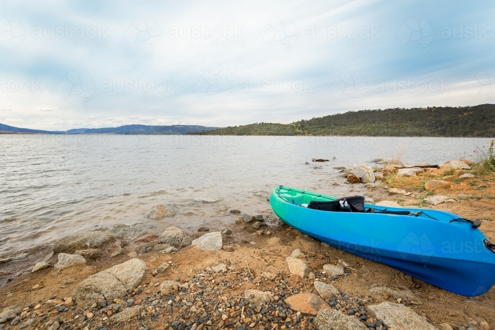 Kayak at the waters edge of Lake Jindabyne - Australian Stock Image