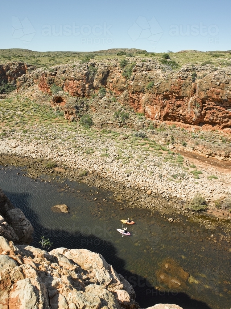 kayakers in remote gorge - Australian Stock Image