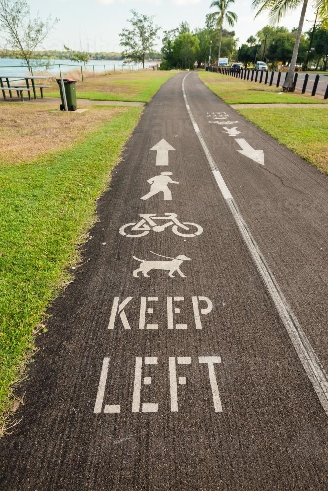 Image of Keep left signs painted on shared bike, and walking path ...