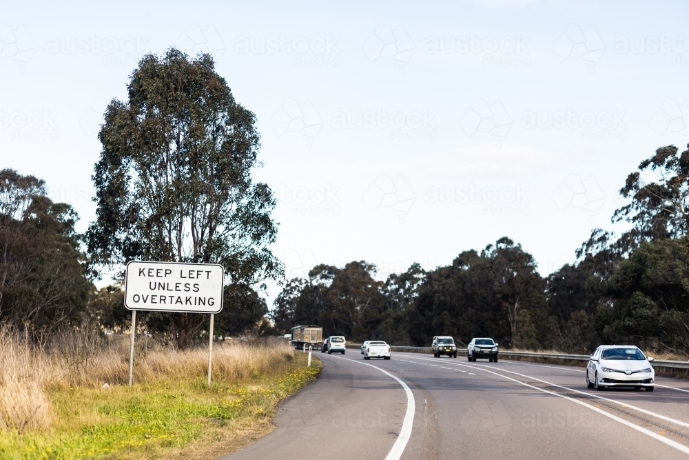 keep left unless overtaking sign on highway at start of overtaking lane - Australian Stock Image