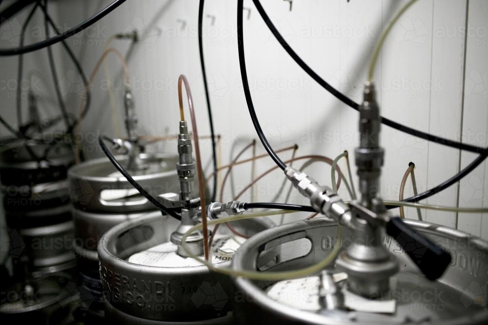 Kegs of beer in a cool room at a pub - Australian Stock Image