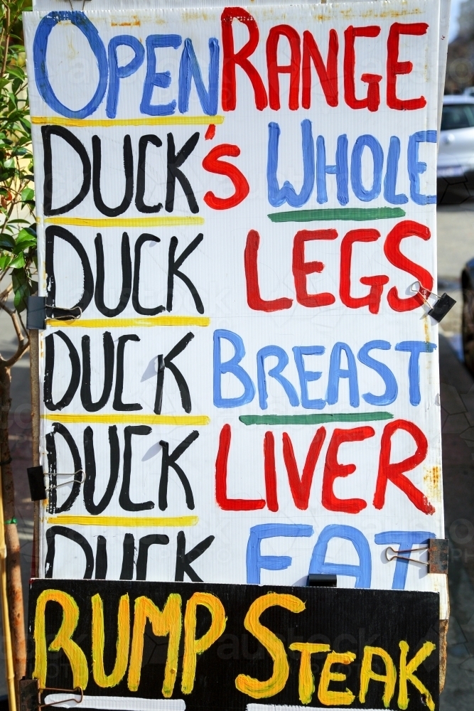 Good Rump Signs Image of Kerbside butcher signs advertise duck meat and rump steak for ...