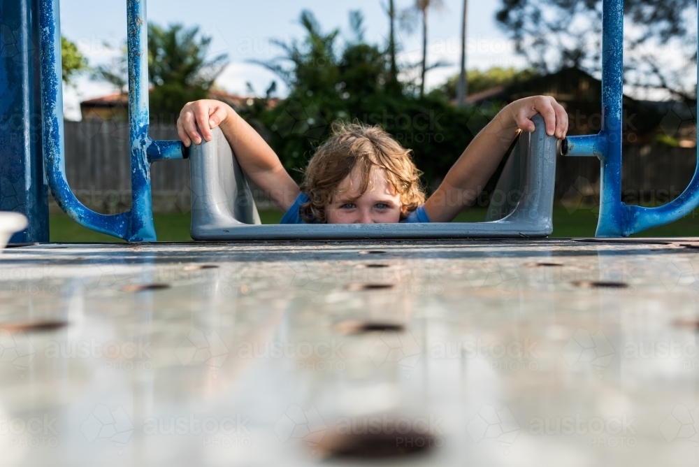 Kids playing at the park outdoors - Australian Stock Image