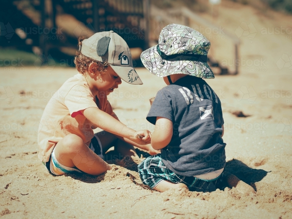 Kids playing on the beach - Australian Stock Image