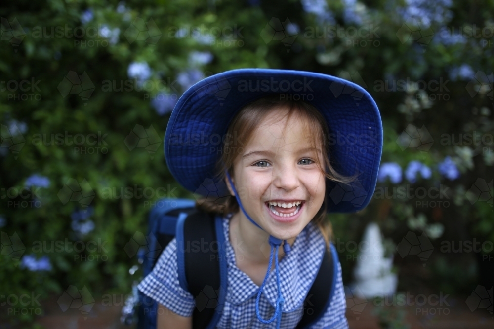 Kindergarten girl smiling in school uniform - Australian Stock Image