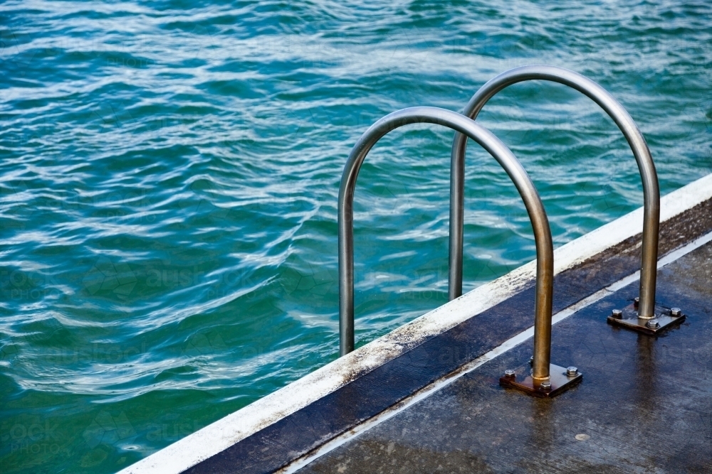 Ladder going into sea pool at Merewether - Australian Stock Image