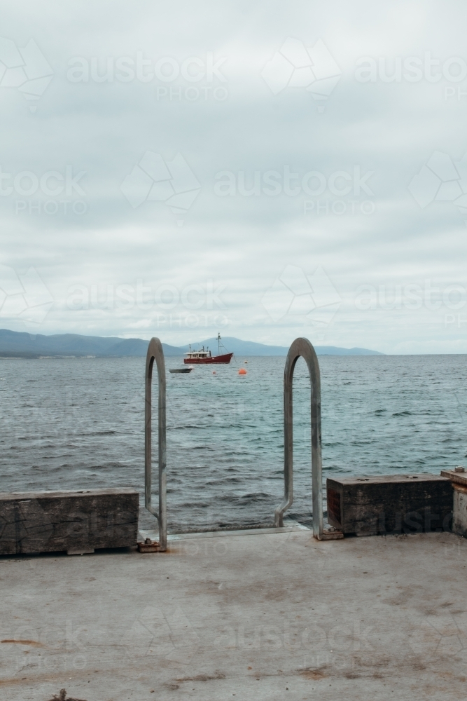Ladder into ocean - Australian Stock Image