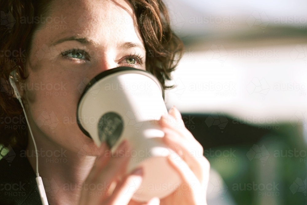 Lady drinking coffee in the morning - Australian Stock Image