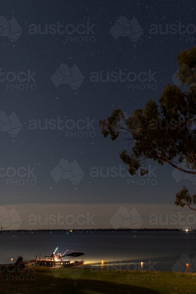 Lake fishing at night in summer - Australian Stock Image