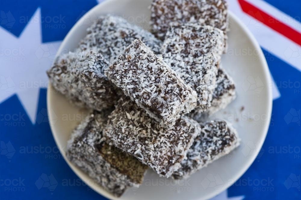 Lamingtons with Aussie flag in background - Australian Stock Image