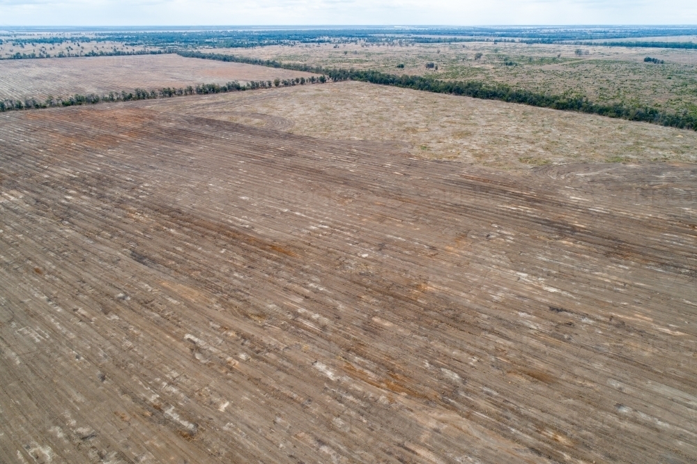 Image of Land getting prepared for farming. - Austockphoto