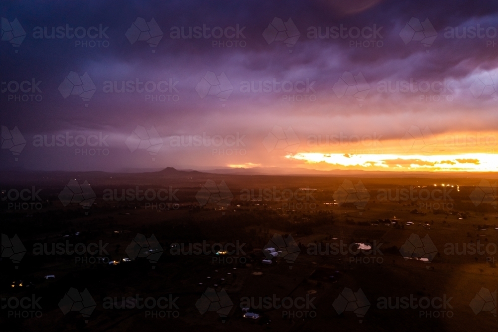 Landscape with dramatic storm clouds at sunset - Australian Stock Image