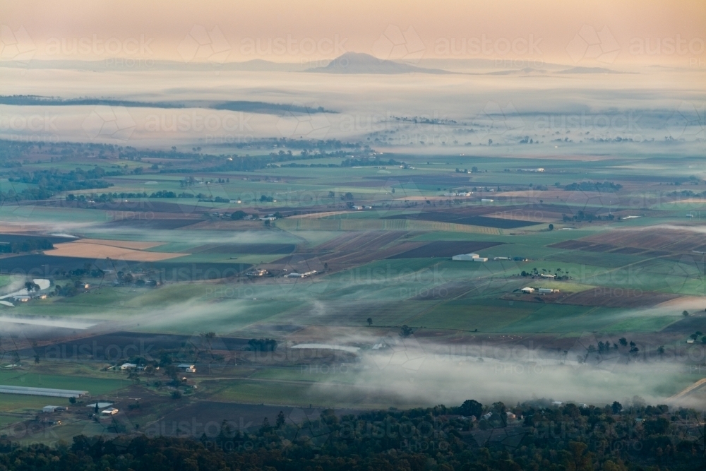 Landscape with early morning  fog and low clouds in the Scenic Rim - Australian Stock Image