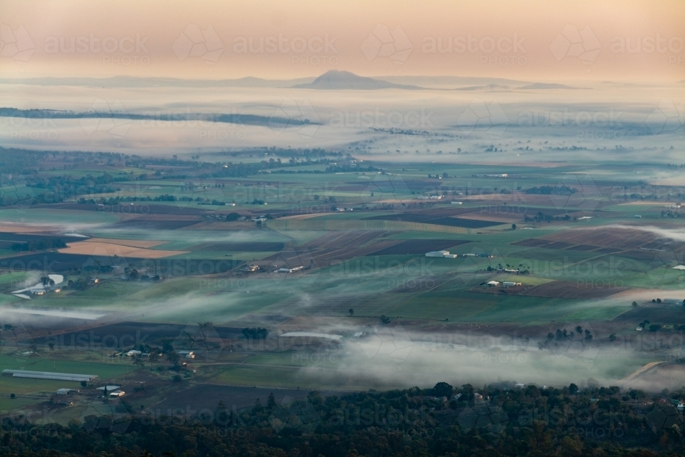 Landscape with early morning  fog and low clouds in the Scenic Rim - Australian Stock Image