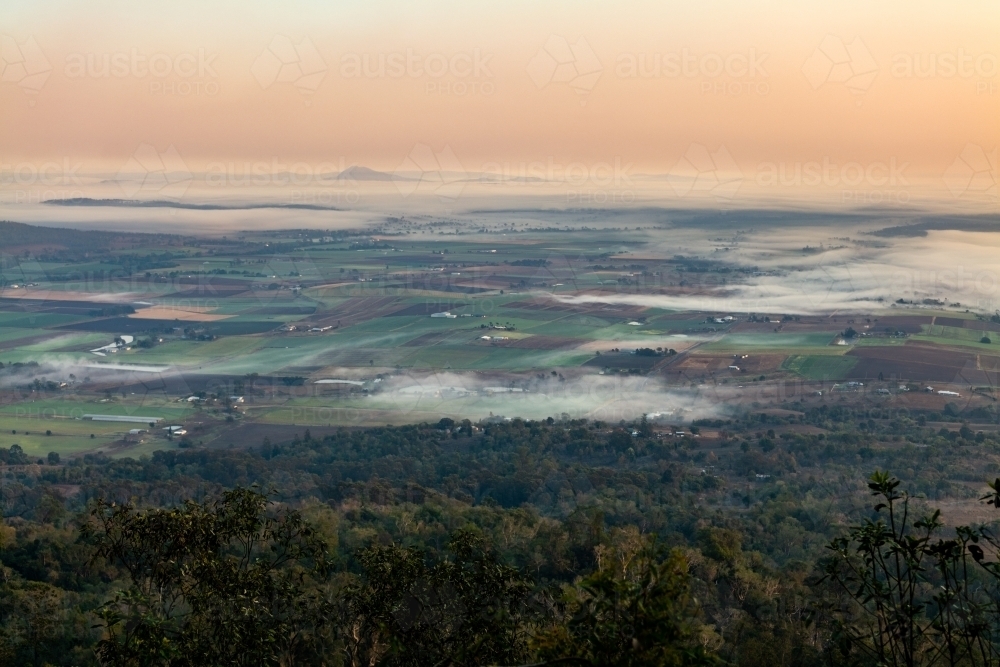 Landscape with early morning  fog and low clouds in the Scenic Rim - Australian Stock Image