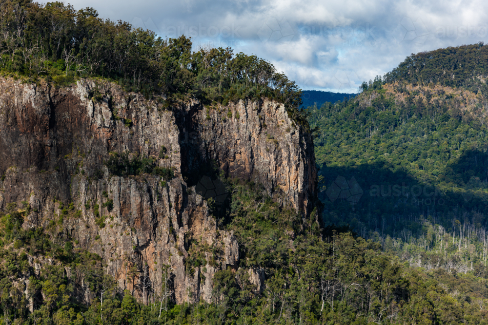 Landscape with rocky cliff and plateau - Australian Stock Image