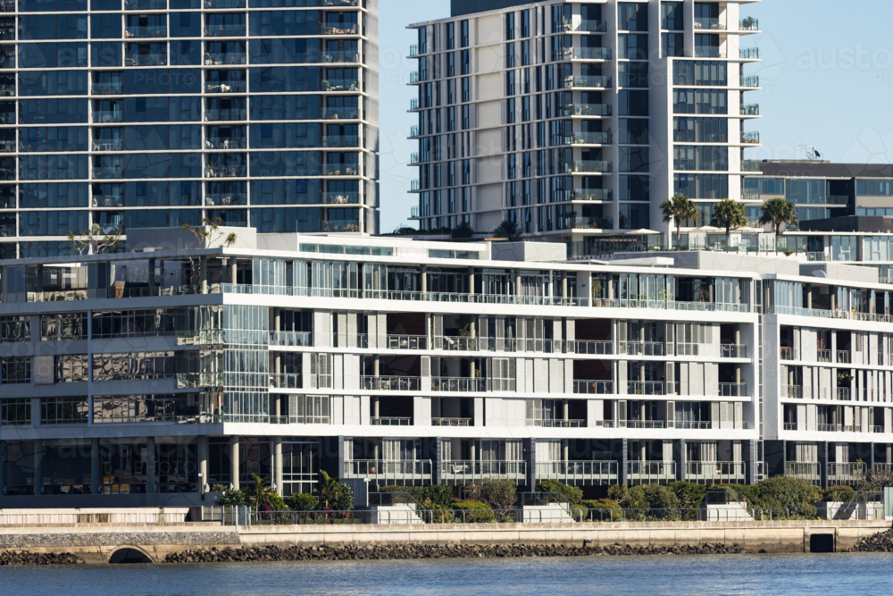 Large apartment blocks adjacent to the Brisbane River in Newstead - Australian Stock Image