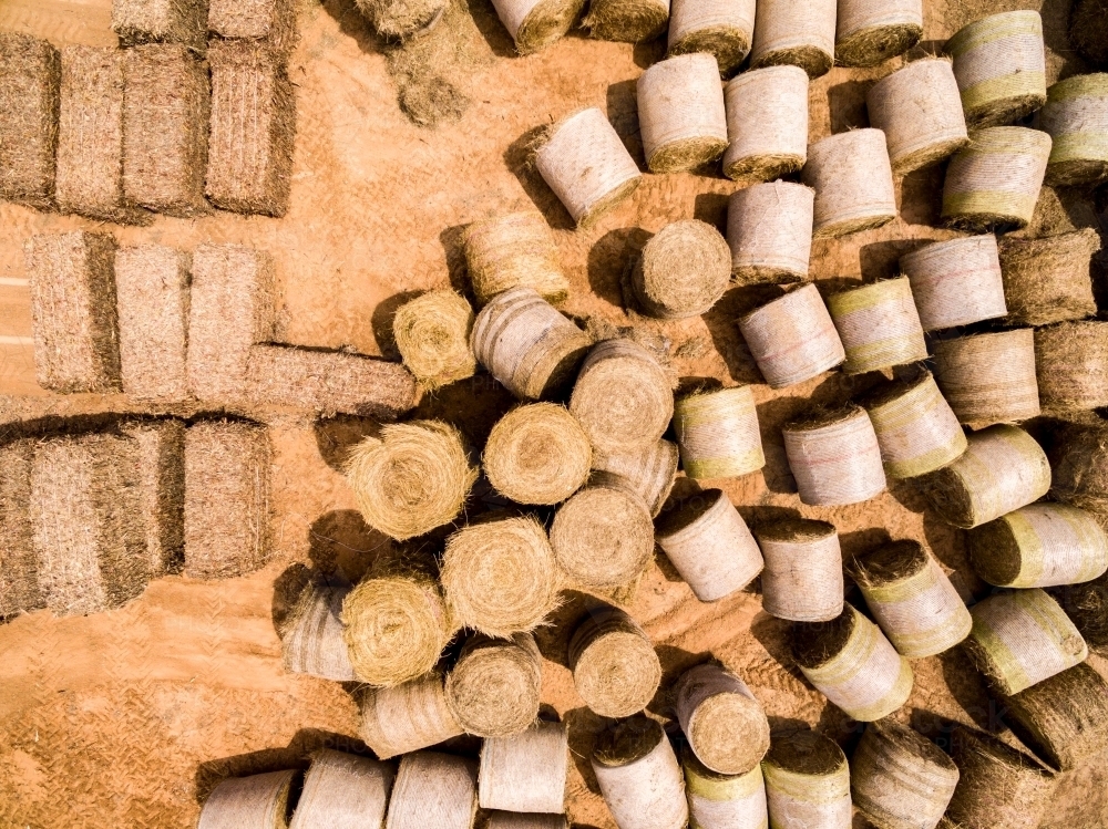 Large hay bales delivered and stacked for drought relief. - Australian Stock Image