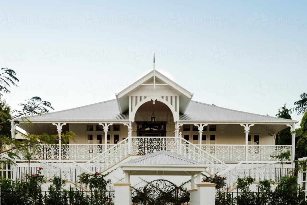 Large queenslander home with butterfly stairs - Australian Stock Image