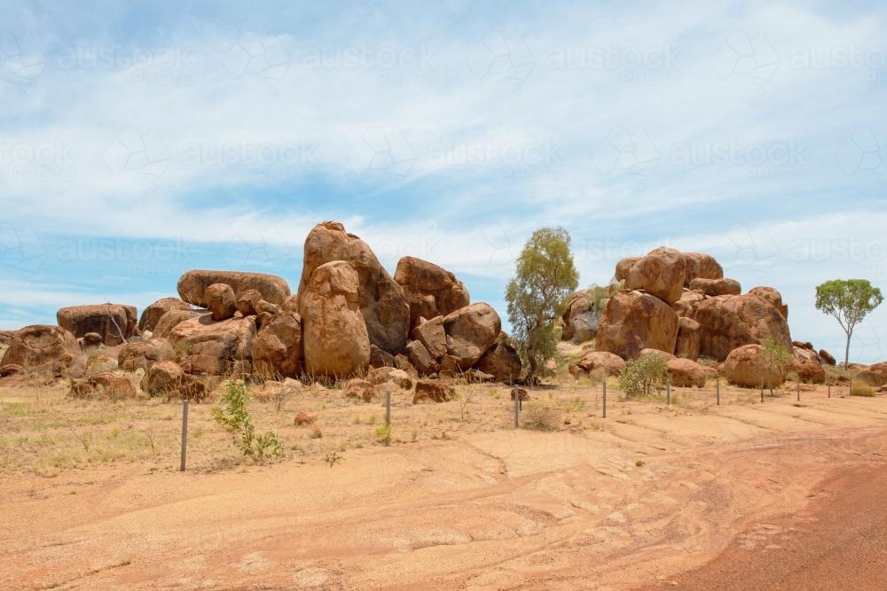 Large rock formation in the desert - Australian Stock Image