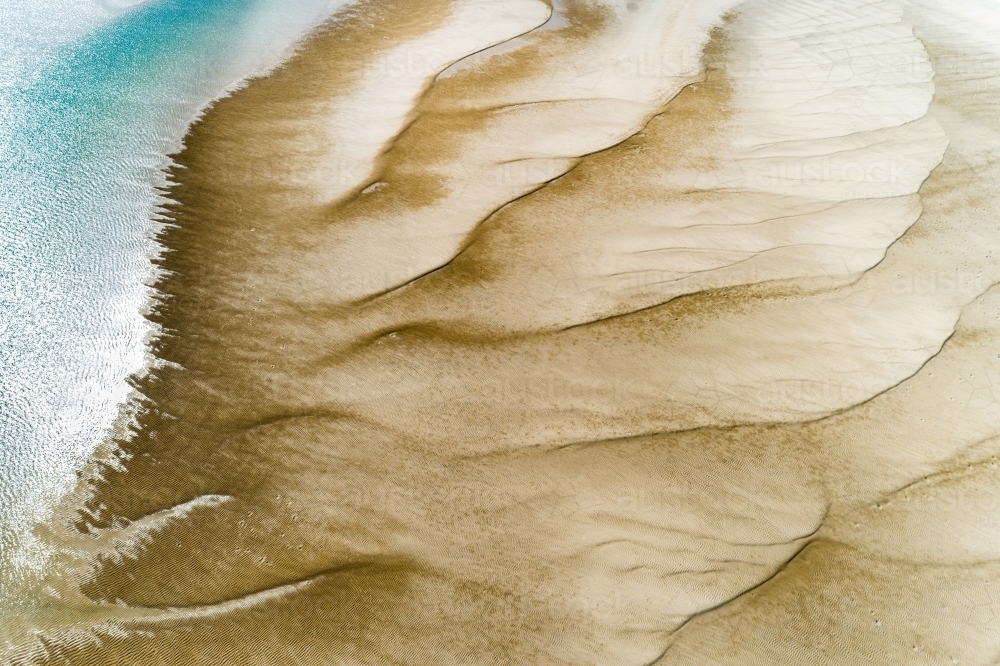 Large sand ripples viewed from above. - Australian Stock Image