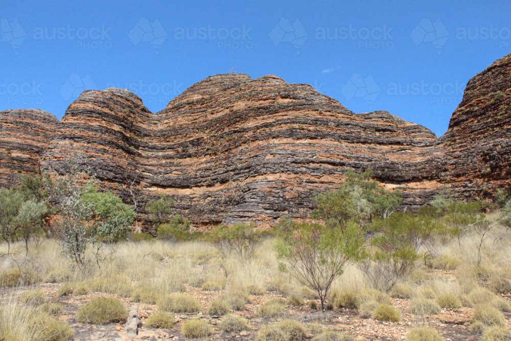 Large striped boulders on a sunny day - Australian Stock Image