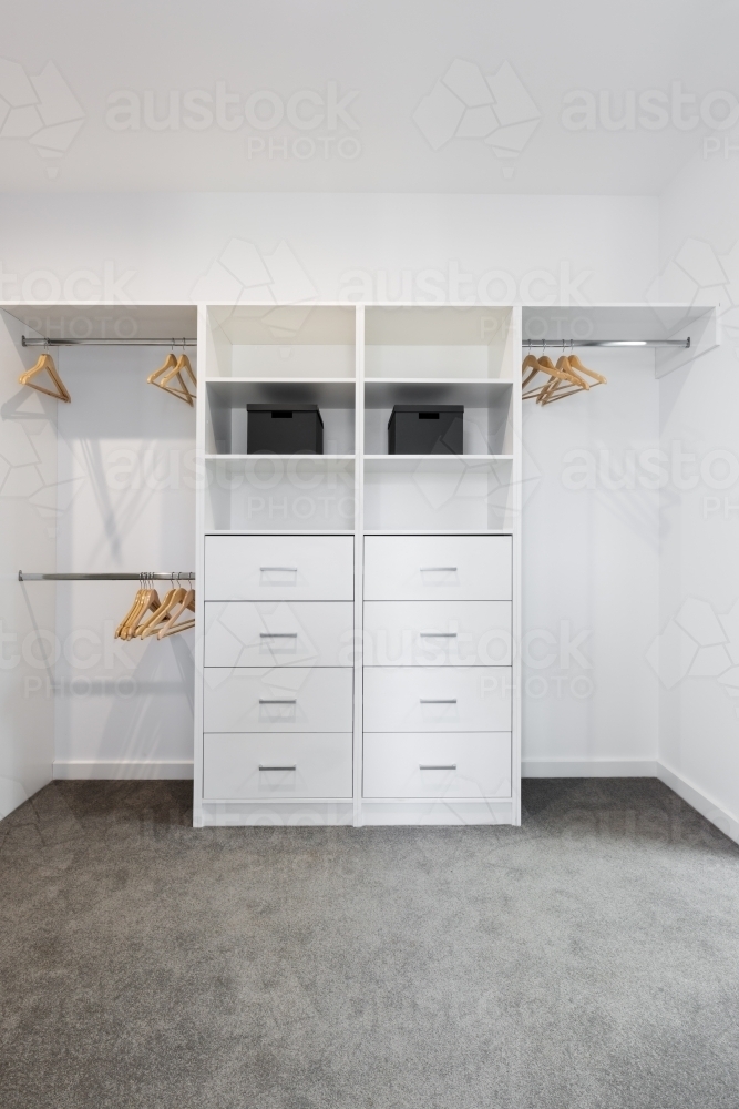 Large walk in wardrobe cabinetry detail - Australian Stock Image
