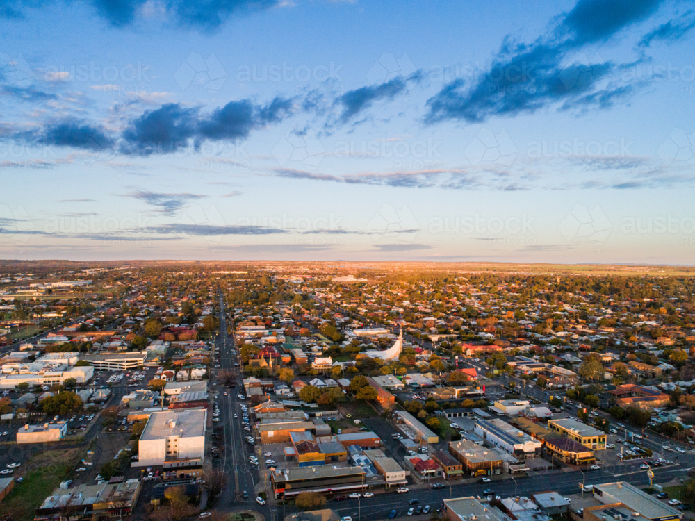 last light of the day over city streets of Dubbo in inland Australia from aerial view - Australian Stock Image