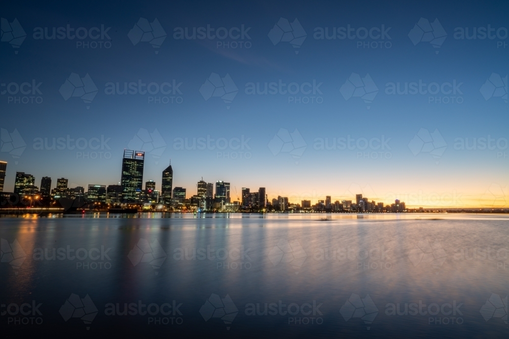 Last light over Swan River and Perth city skyline - Australian Stock Image