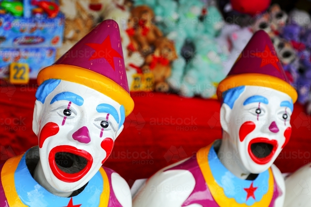 Laughing Clowns game of chance at a sideshow alley stall. - Australian Stock Image