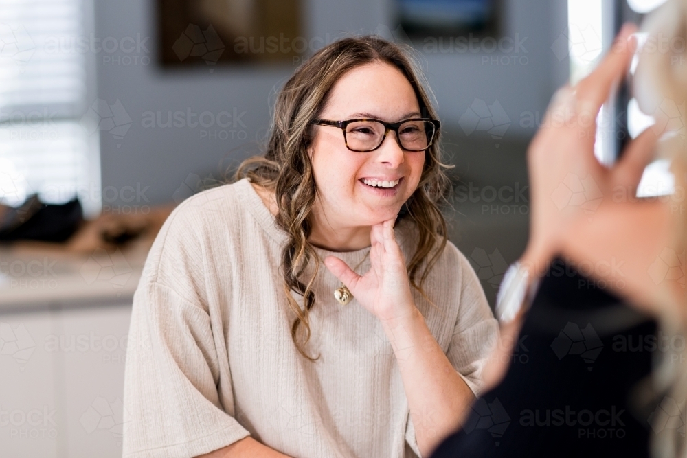 laughing young woman. from a series featuring a woman with Down Syndrome - Australian Stock Image