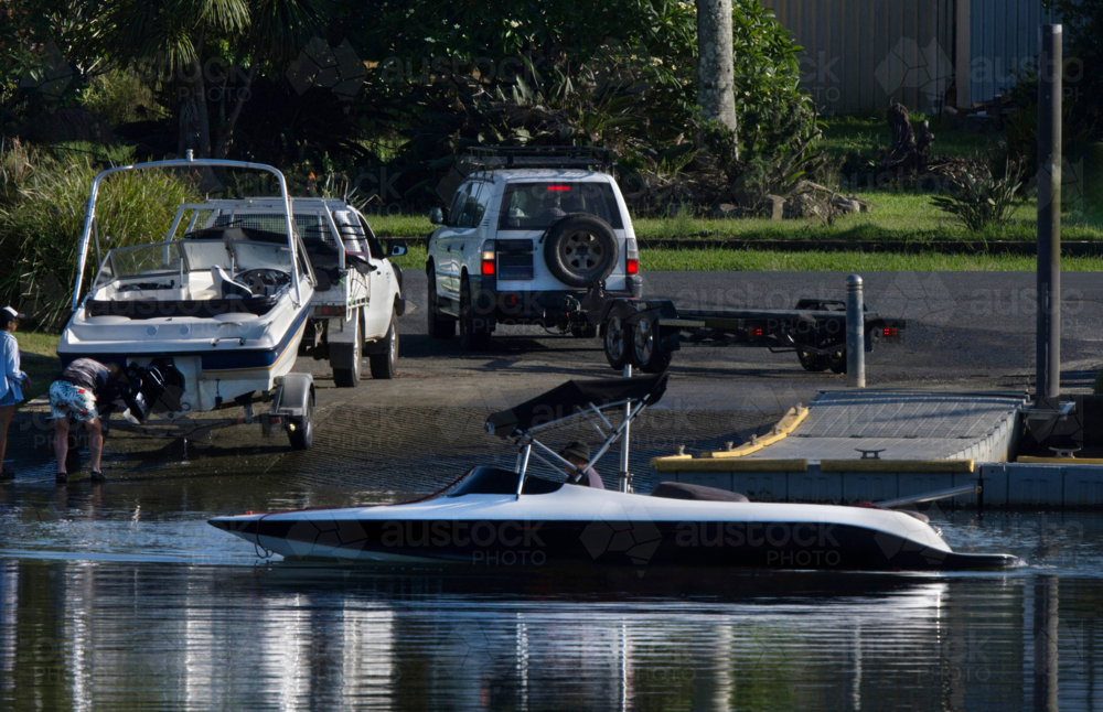 launching boats at a busy boat ramp - Australian Stock Image
