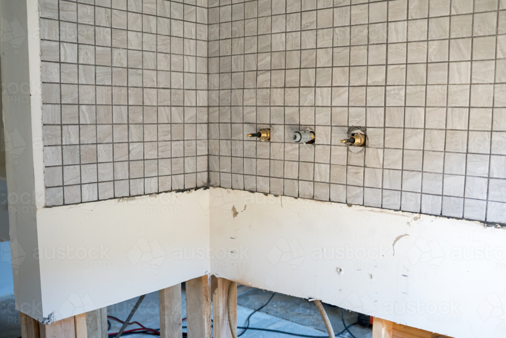 Laundry renovation - Tiled Splashback without taps - Australian Stock Image