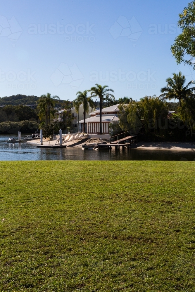lawn and luxury waterfront property in Noosa - Australian Stock Image