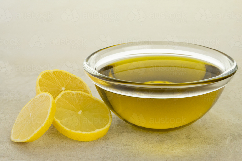 Lemon-infused olive oil - Australian Stock Image