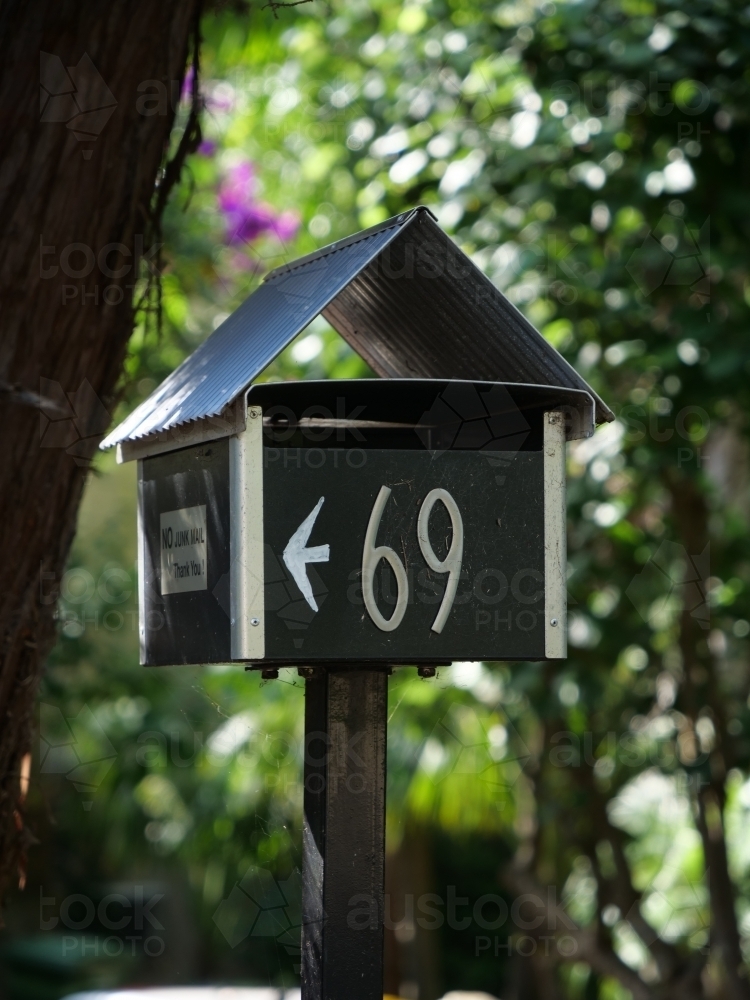 Letterbox for #69 with arrow - Australian Stock Image